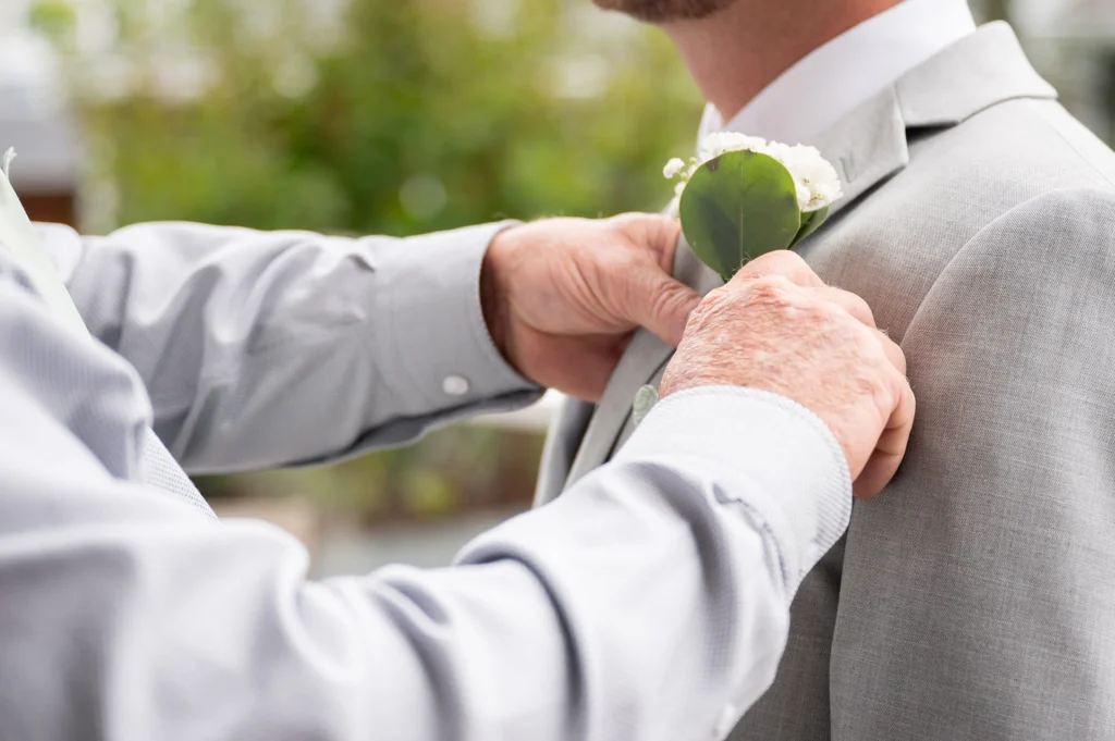 How To Pin A Boutonniere - Pulse Productions Inc.